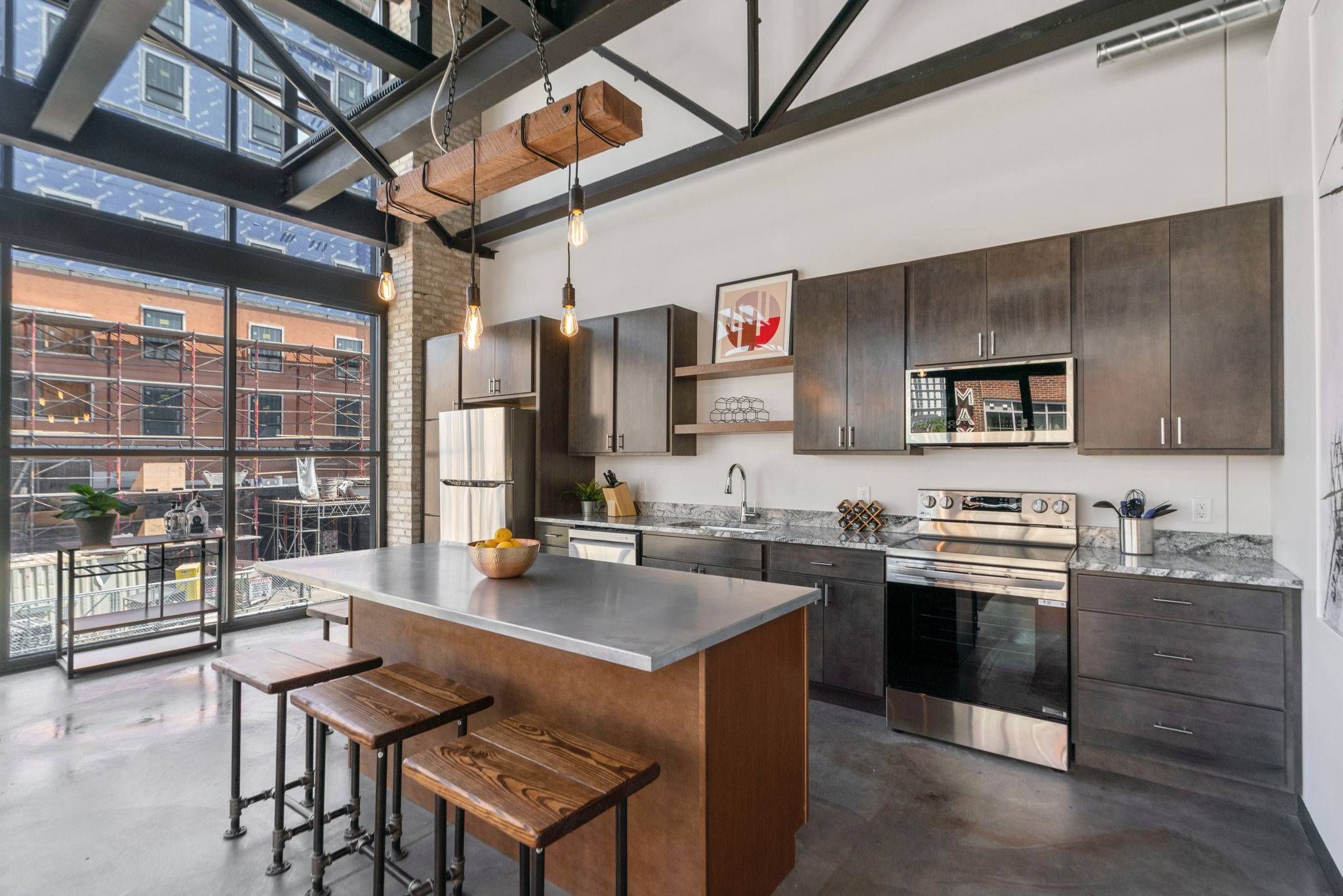 Factory Lofts apartment interior view of spacious modern kitchen